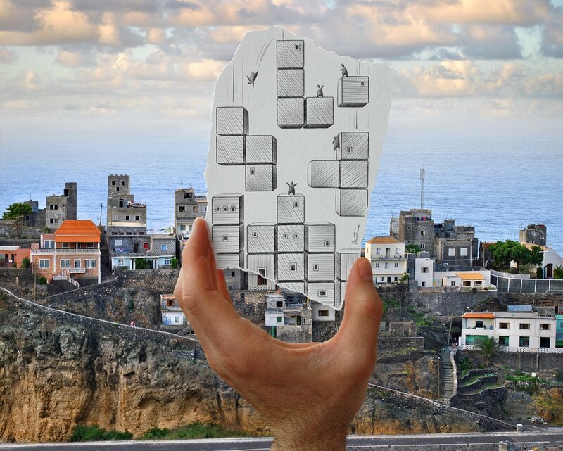 hand holding a drawing of blocks