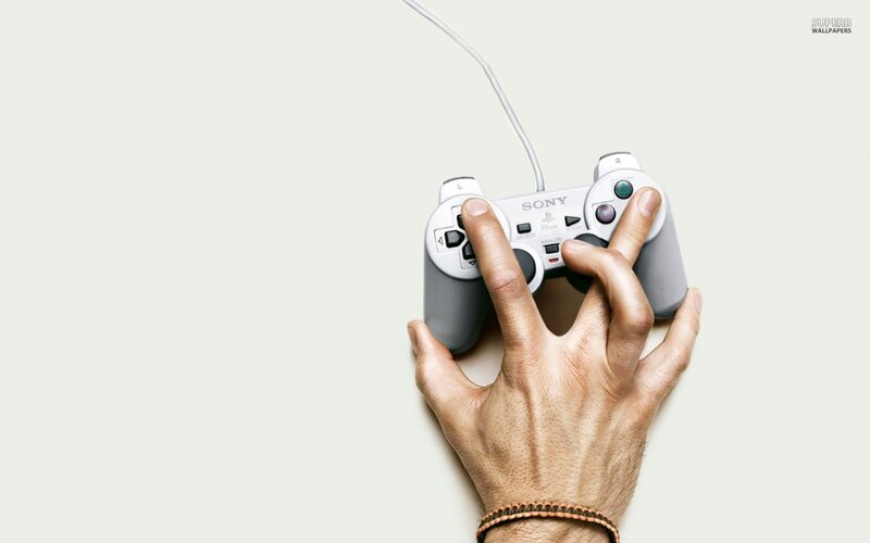 hand holding a game controller