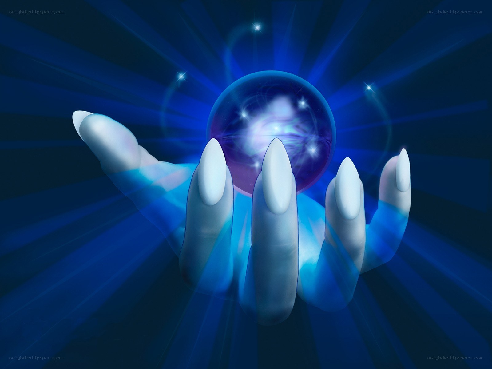hand holding a glowing crystal ball