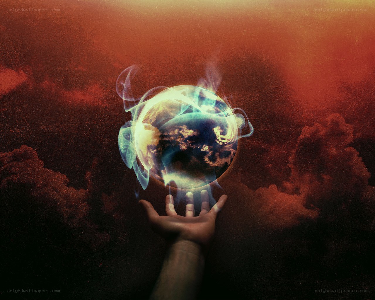 hand holding a glowing earth
