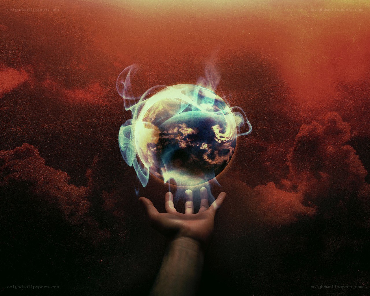 hand holding a glowing earth