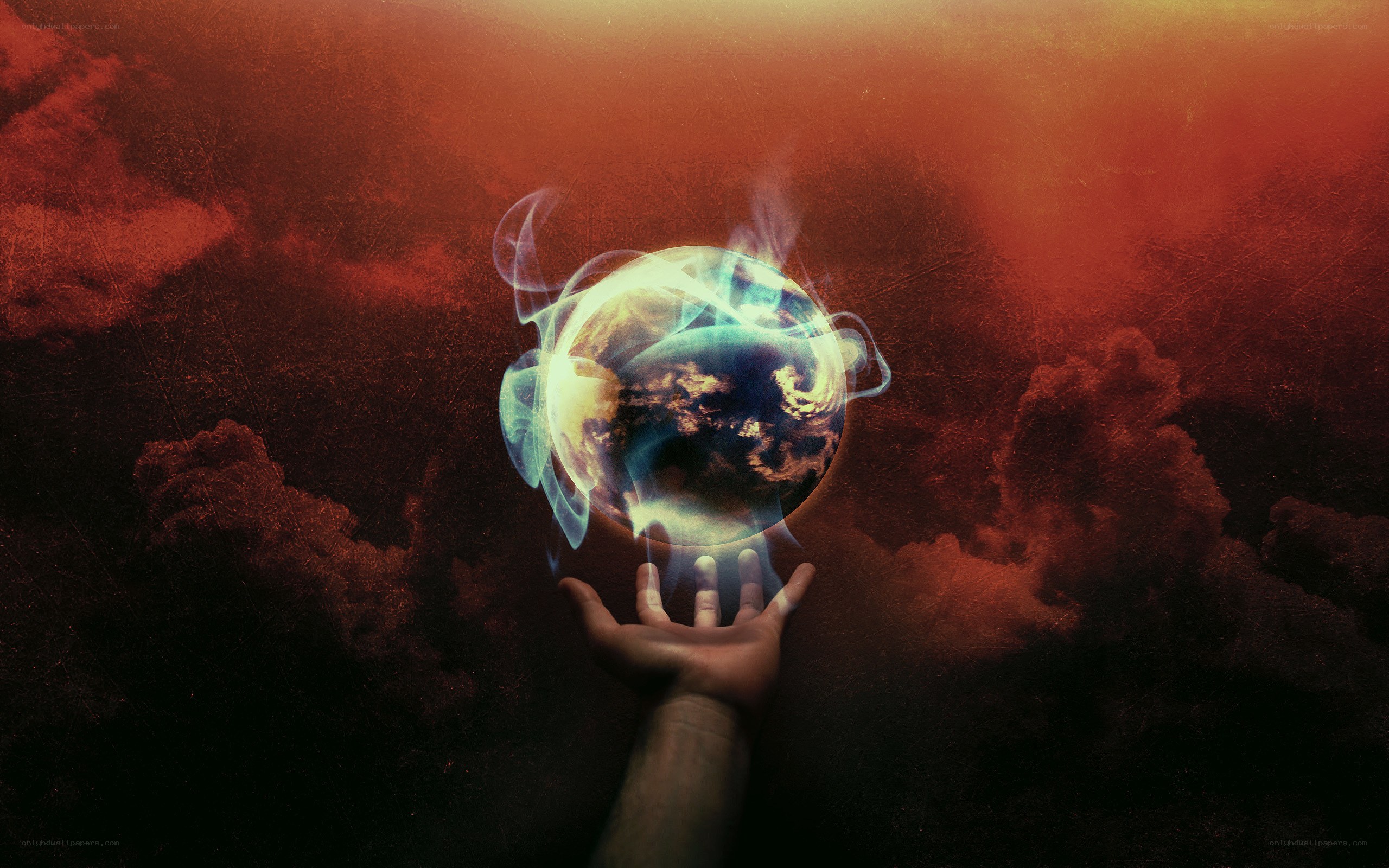 hand holding a glowing earth