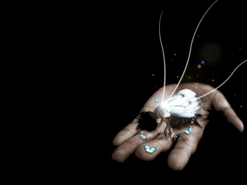hand holding a glowing fairy