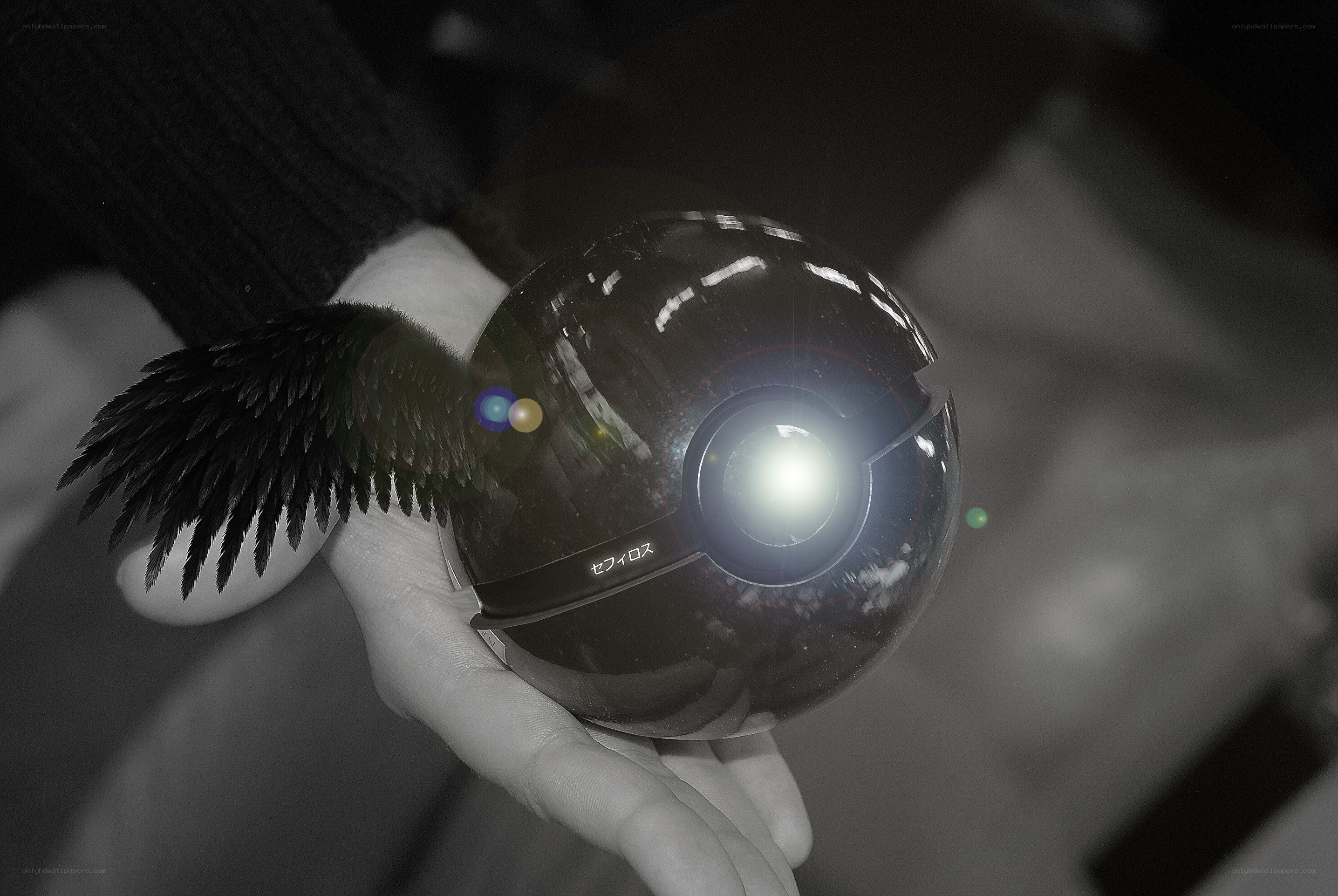 hand holding a glowing orb