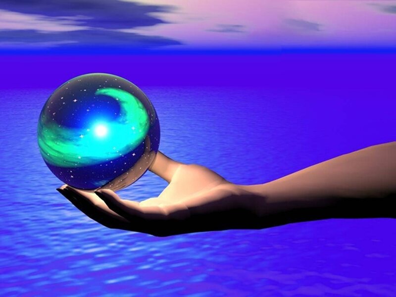 hand holding a glowing sphere