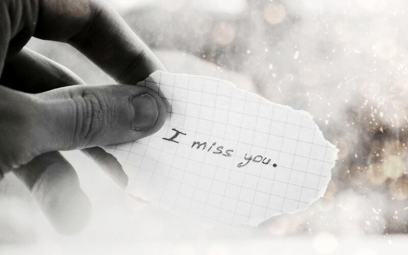 hand holding a note