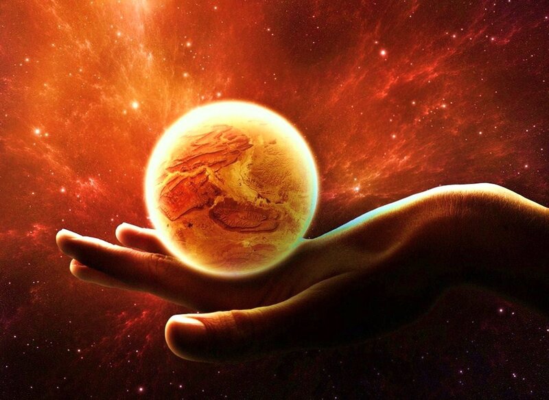 hand holding a planet