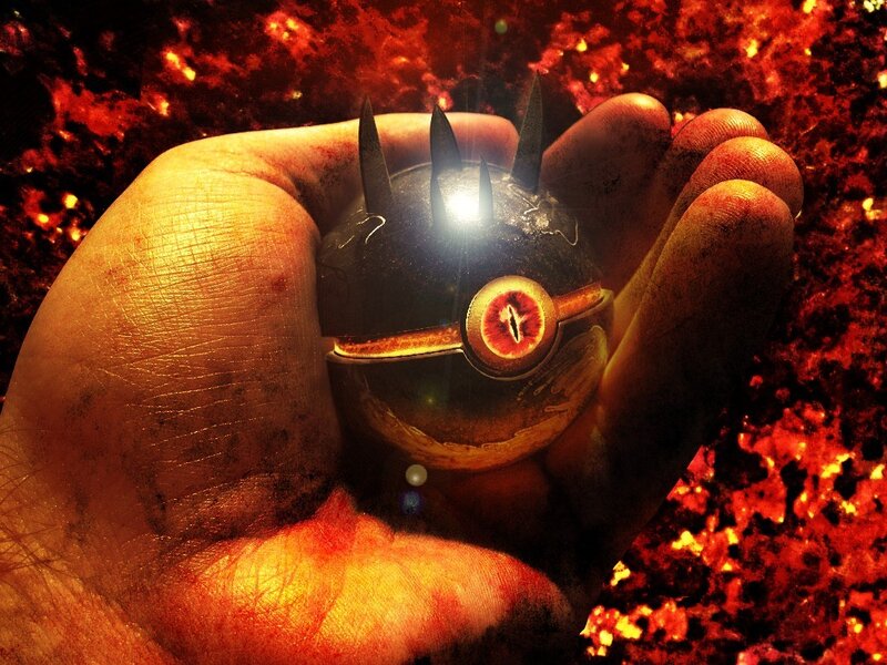 Hand Holding a Pokeball — Red