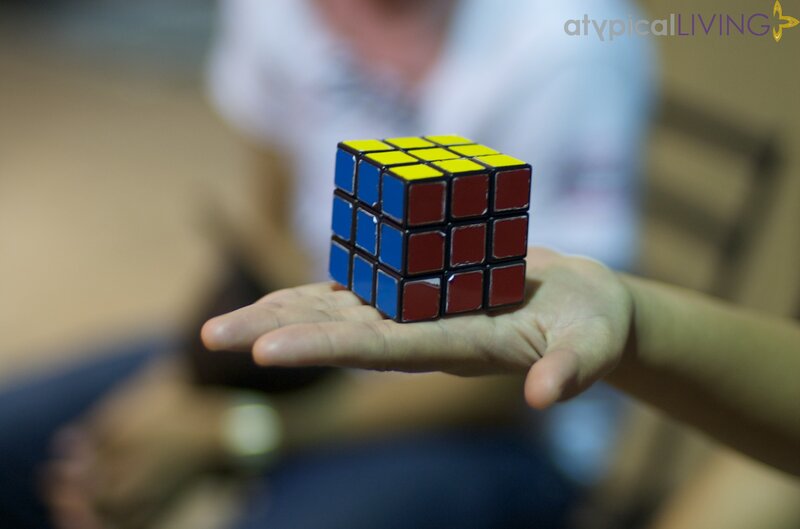 hand holding a rubik's cube