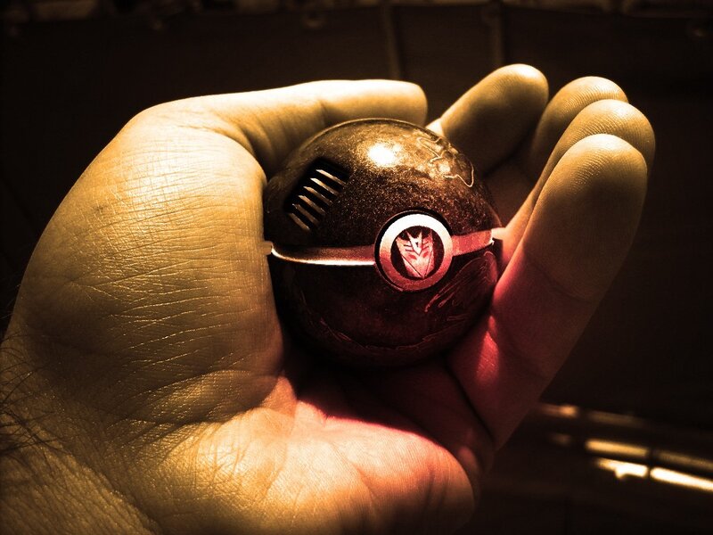 Hand Holding a Sphere — Brown