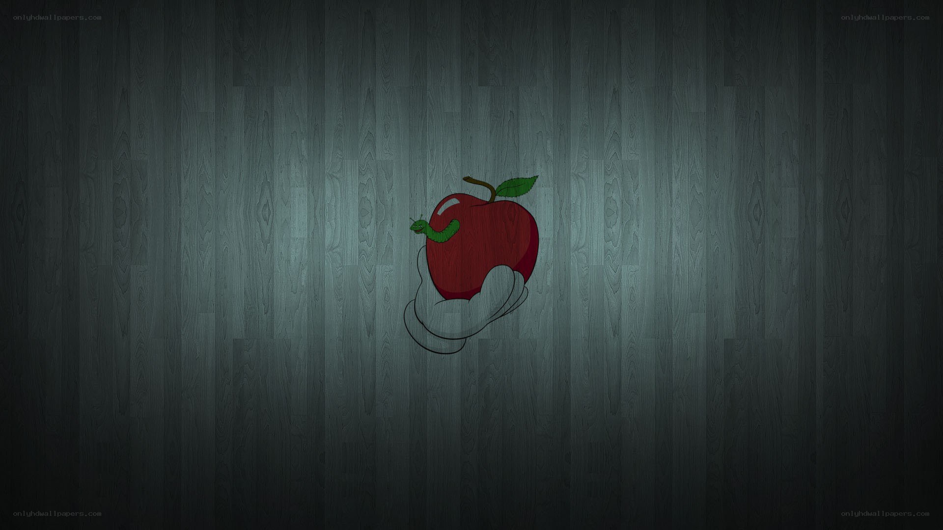 hand holding apple with snake