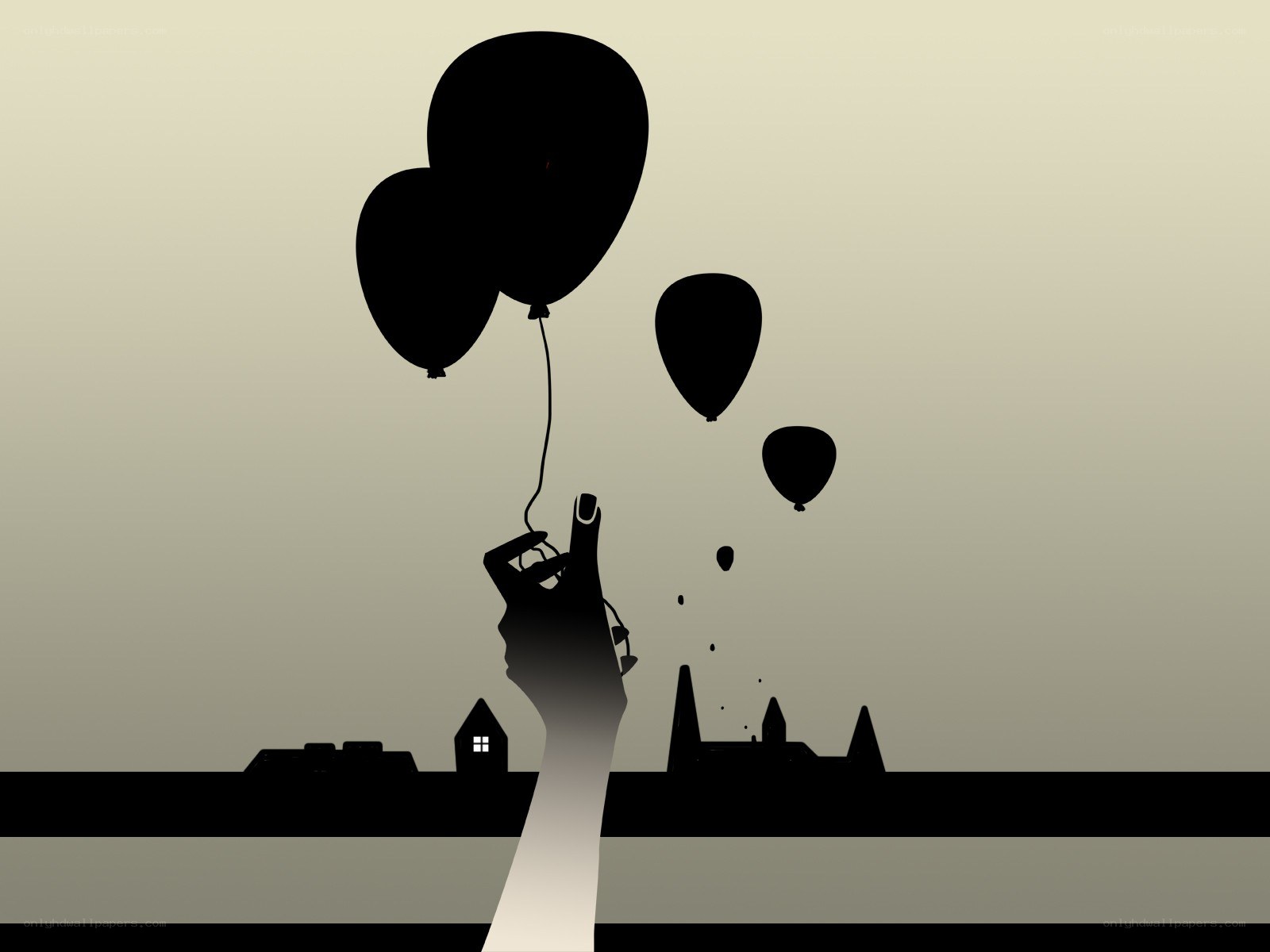 hand holding balloons at dusk