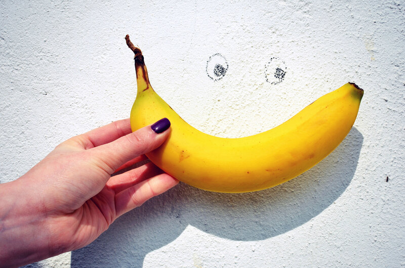 Hand Holding Banana