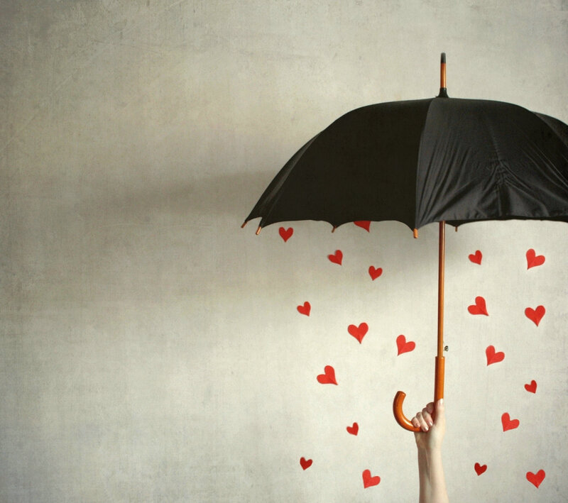 Hand Holding Black Umbrella