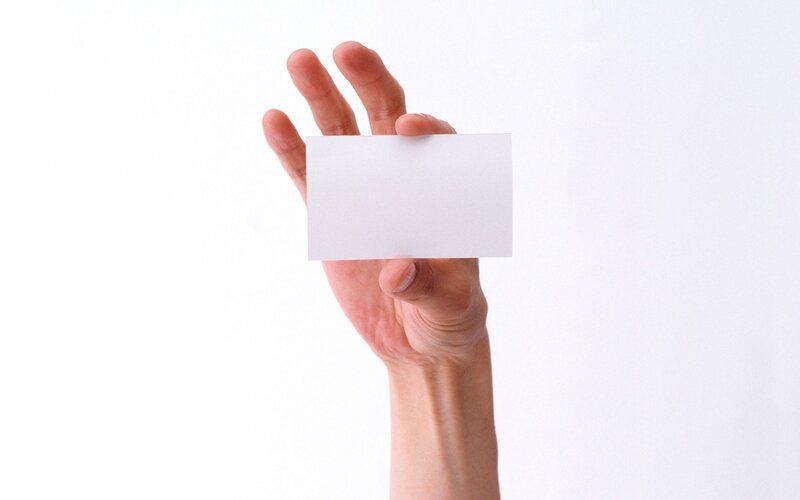 hand holding blank card
