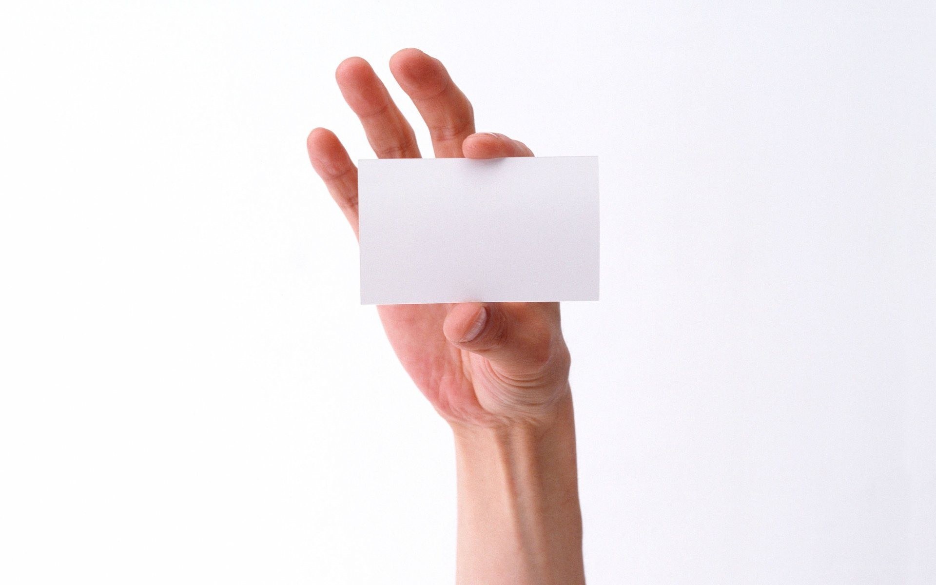 hand holding blank card