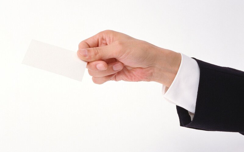 hand holding blank card