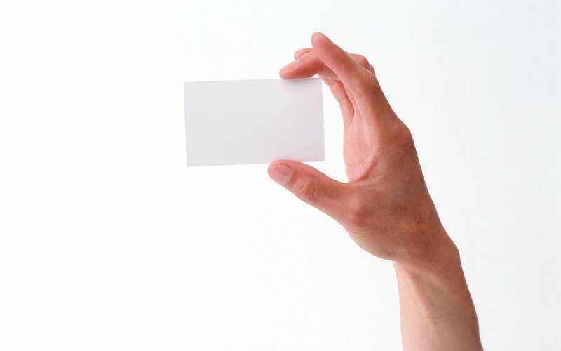hand holding blank card