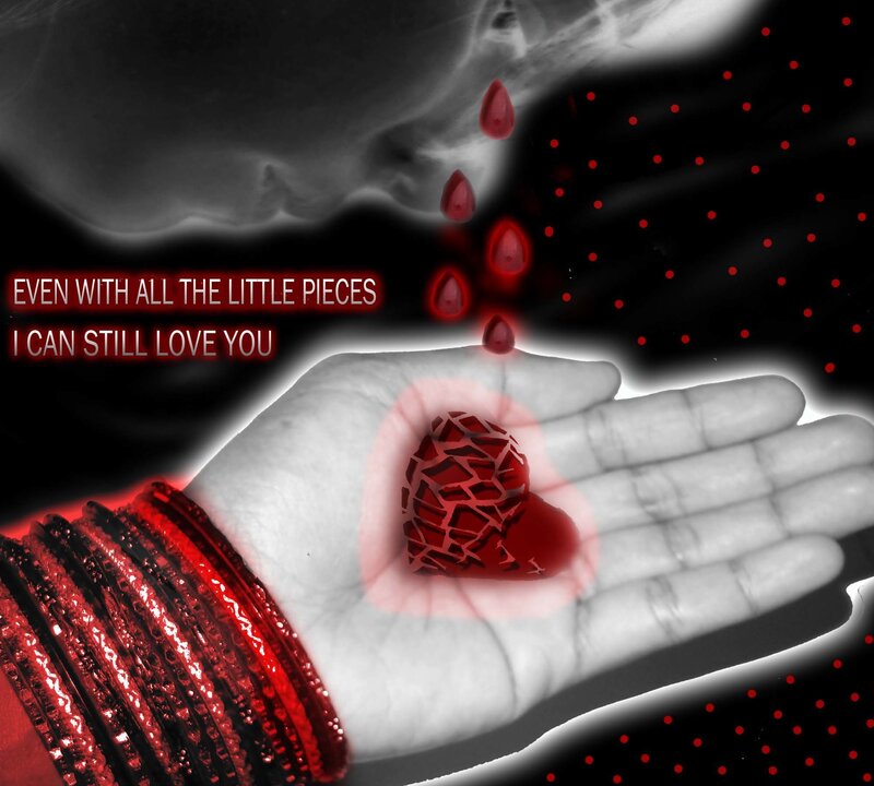 Hand Holding Broken Heart