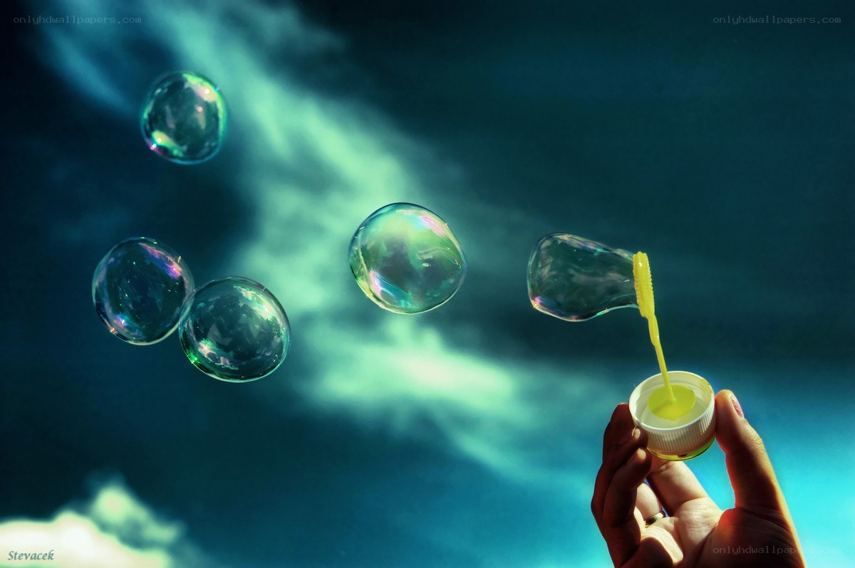 Hand holding bubble wand