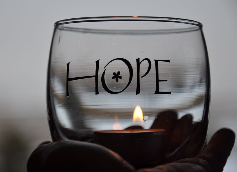 Hand Holding Candle Holder