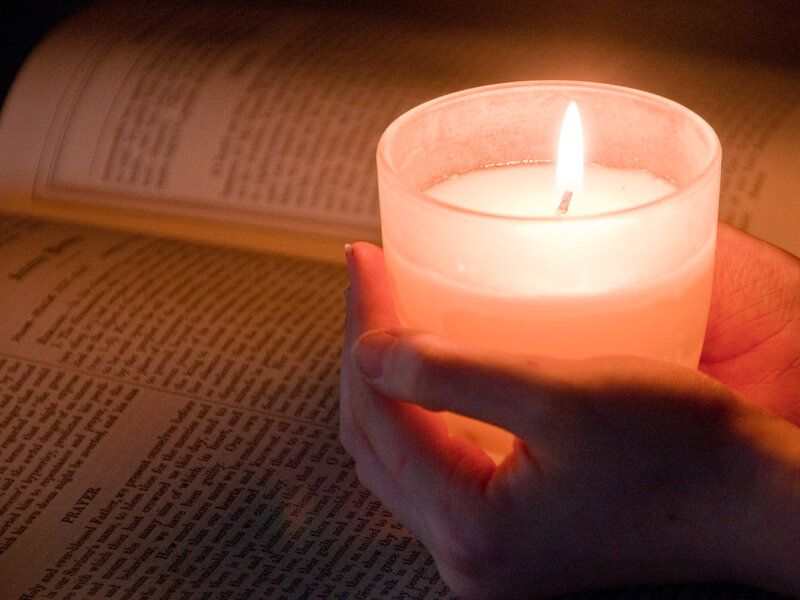 Hand Holding Candle — White