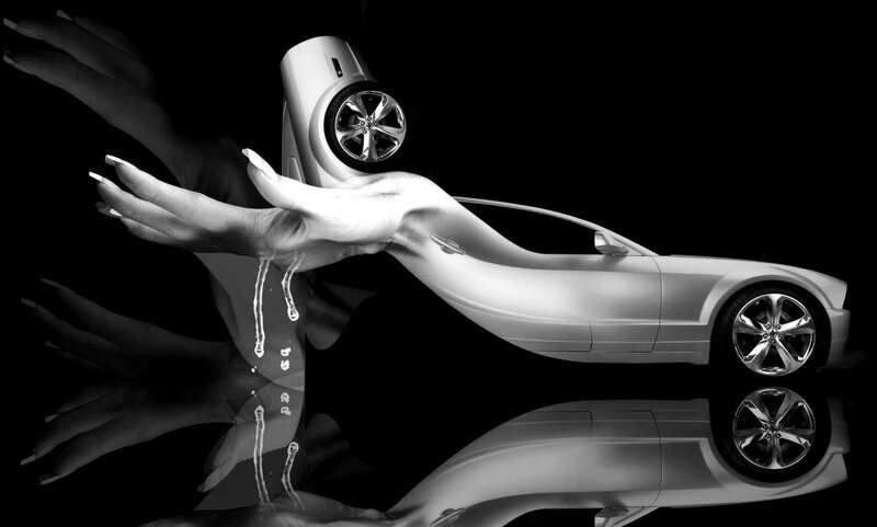 Hand Holding Car Model