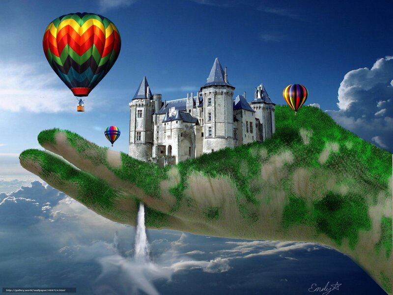 Hand holding castle with hot air balloons