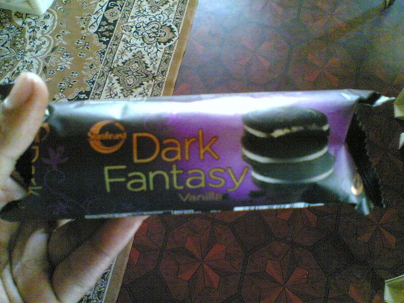 Hand Holding Chocolate Bar