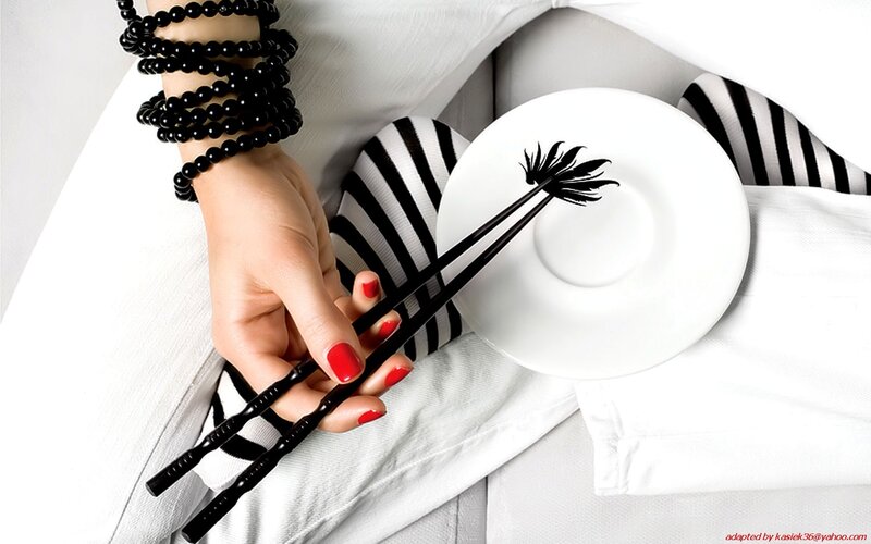 hand holding chopsticks