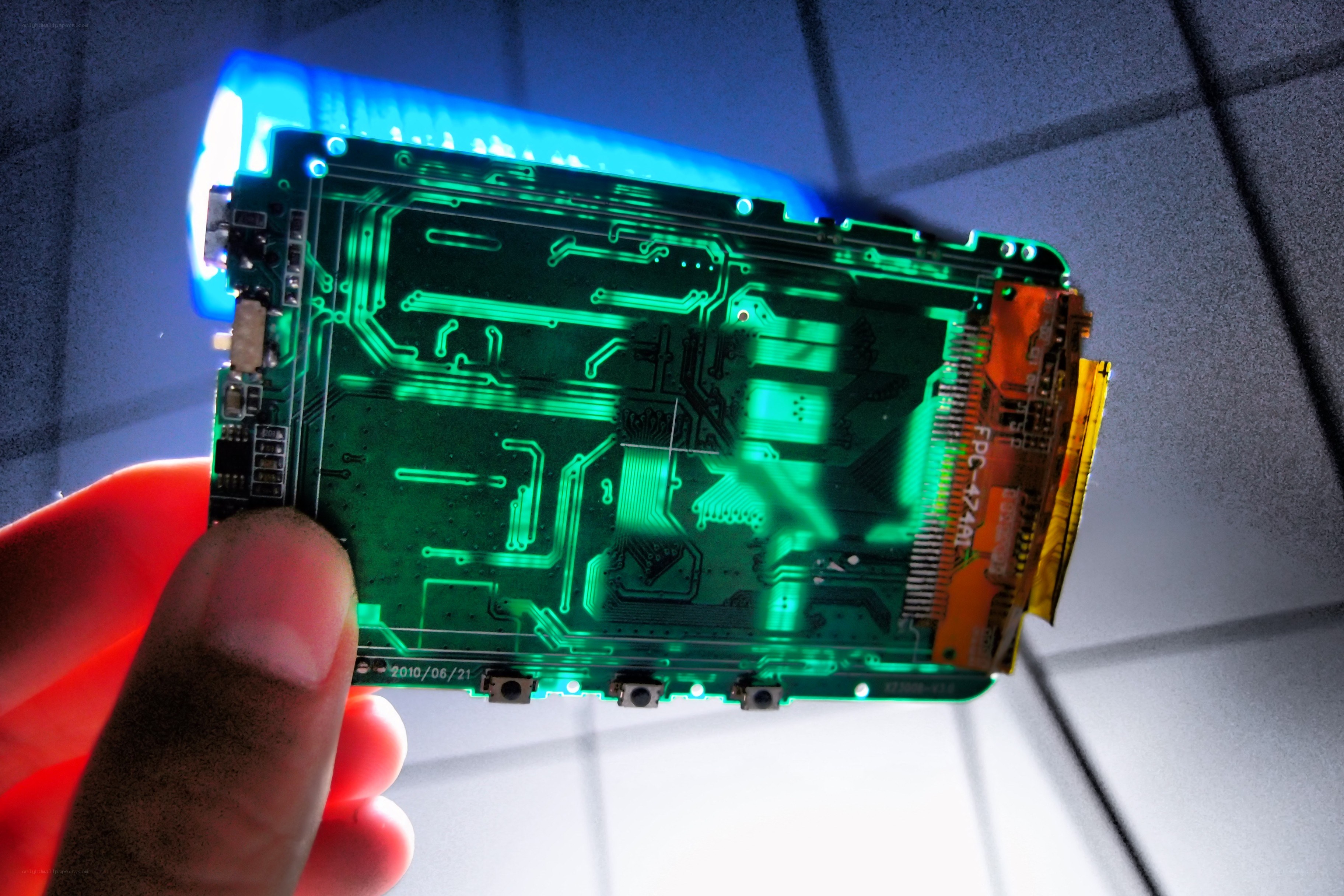 hand holding circuit board