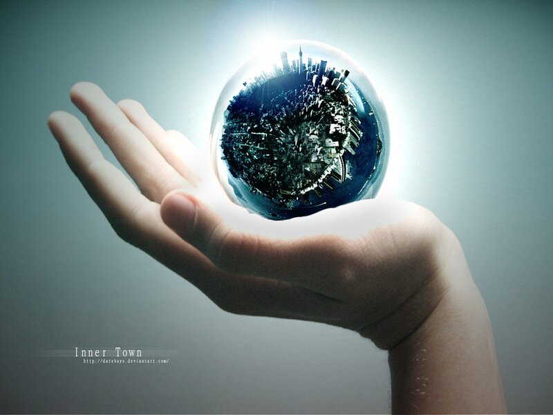 hand holding city globe
