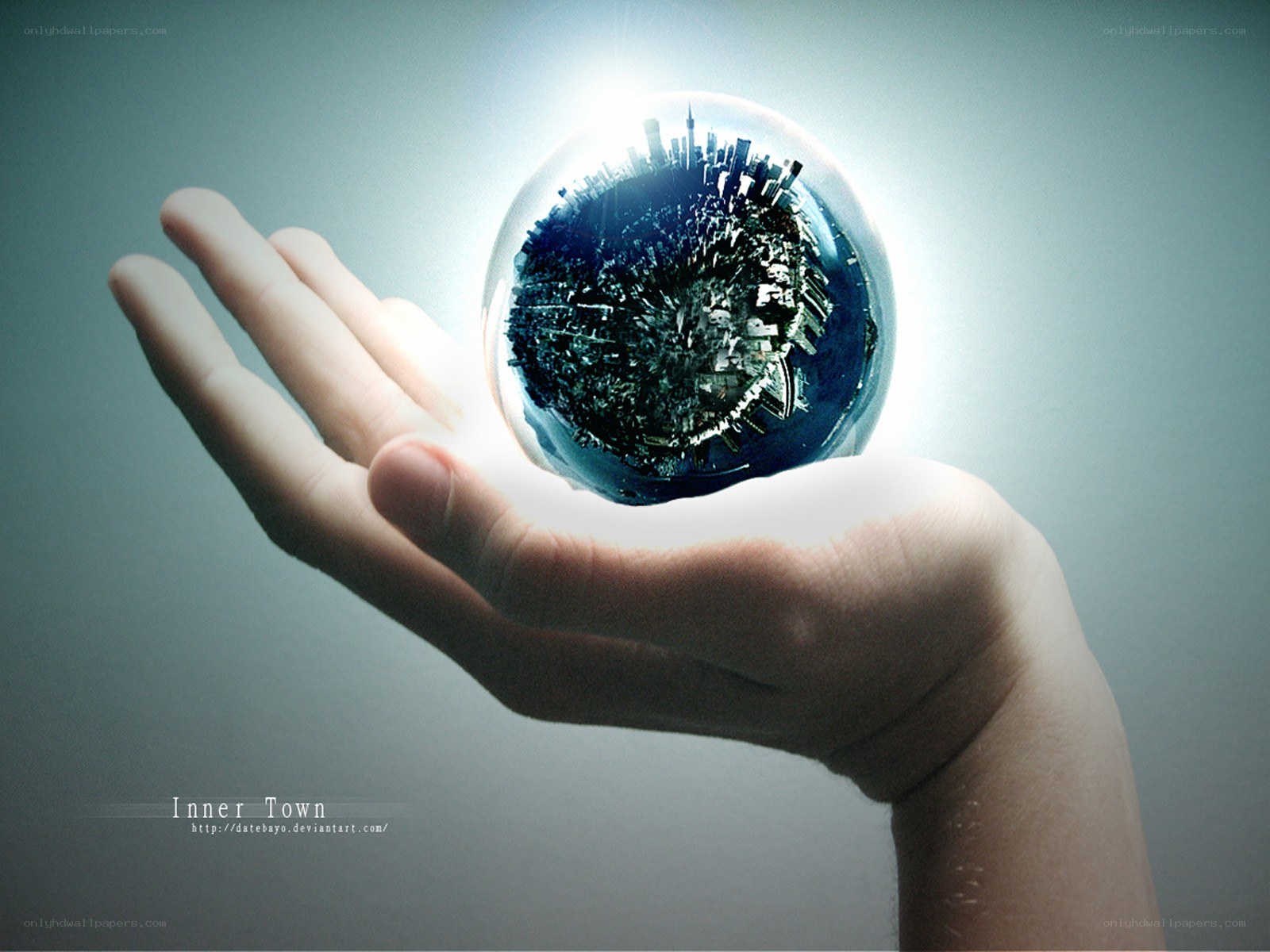 hand holding city globe