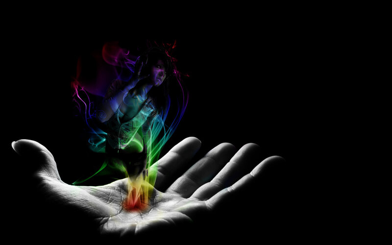 hand holding colorful energy