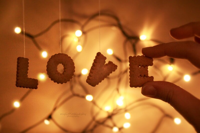 Hand Holding Cookie Letters