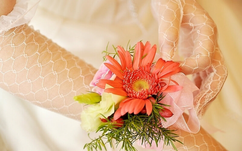 Hand Holding Corsage