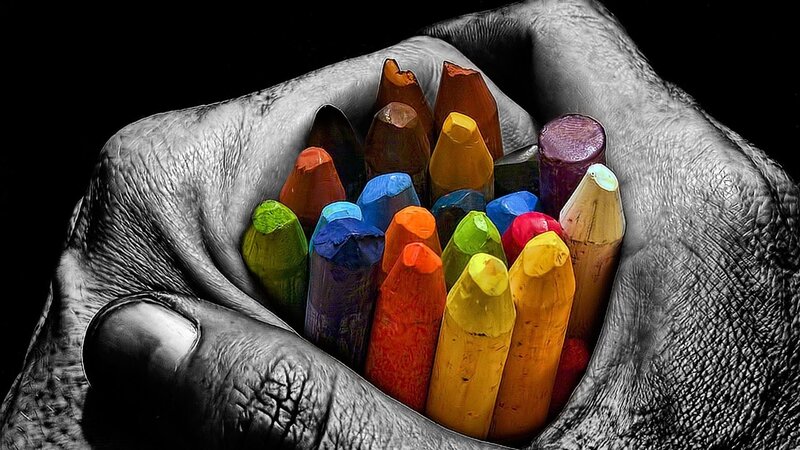 Hand Holding Crayons — Black, Dramatic