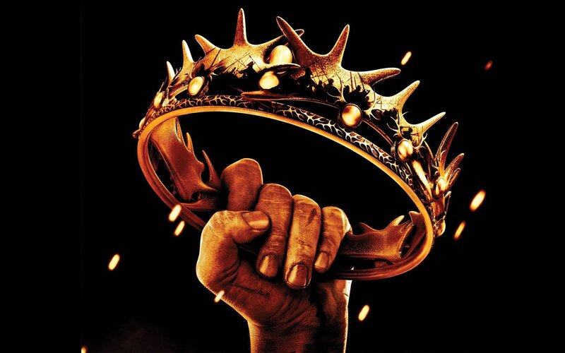 Hand Holding Crown — Gold