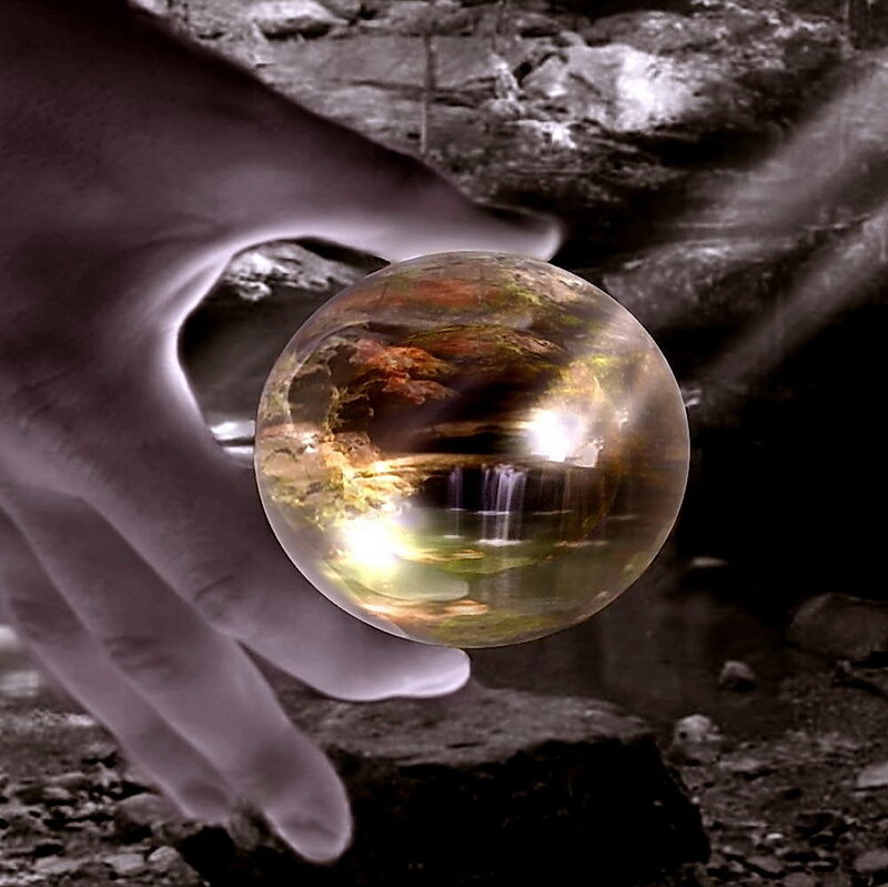 hand holding crystal ball