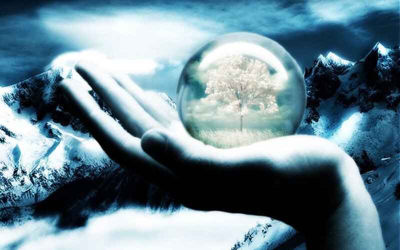 Hand Holding Crystal Ball — Blue