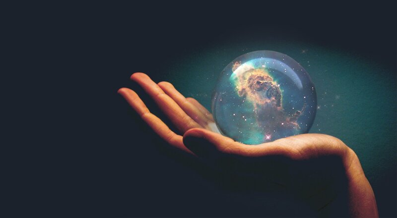 Hand Holding Crystal Ball — Dark Blue