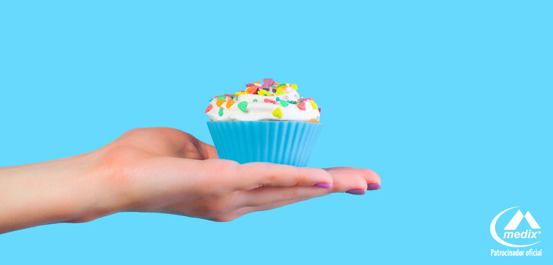 Hand Holding Cupcake