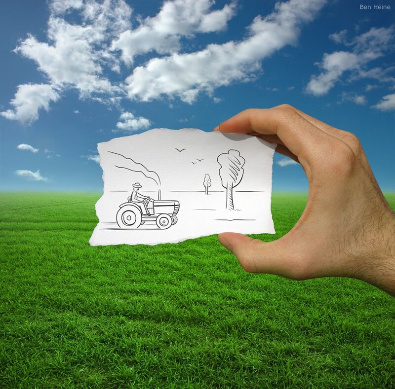 hand holding drawing of tractor