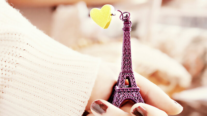 Hand Holding Eiffel Tower — Purple