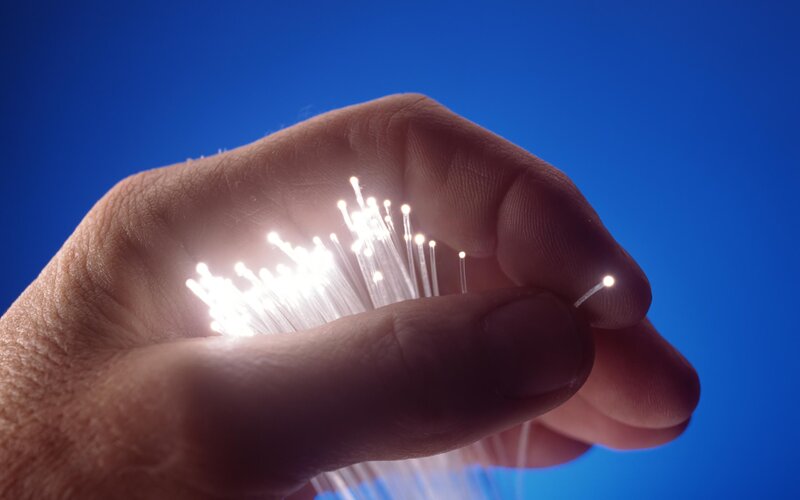 Hand Holding Fiber Optics
