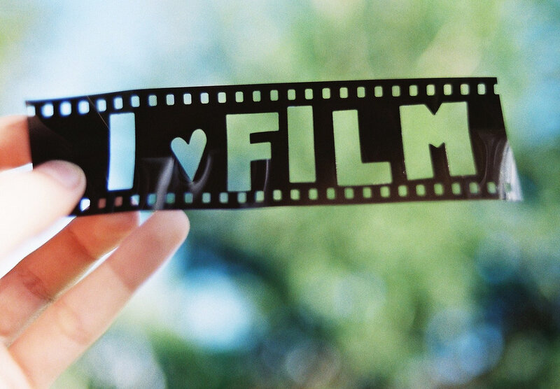 Hand Holding Film Strip