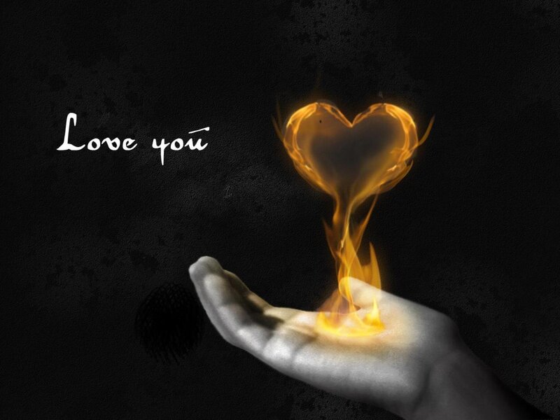 Hand Holding Fire Heart