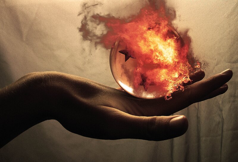 Hand Holding Fire Orb