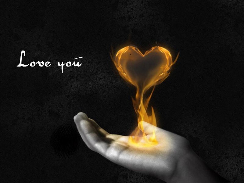 Hand Holding Flame Heart