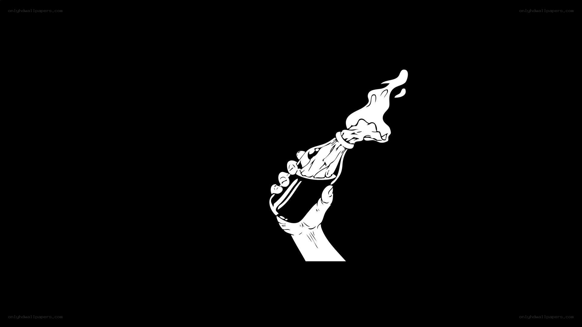 hand holding flaming bottle